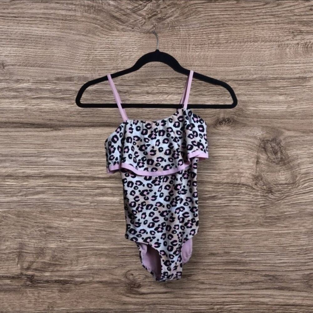 Justice ruffle top leopard print one piece swimsuit. Size 12.